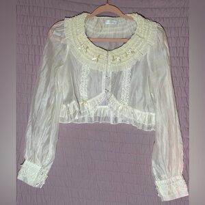 Elegant White Sheer Blouse with Ruffle Details
